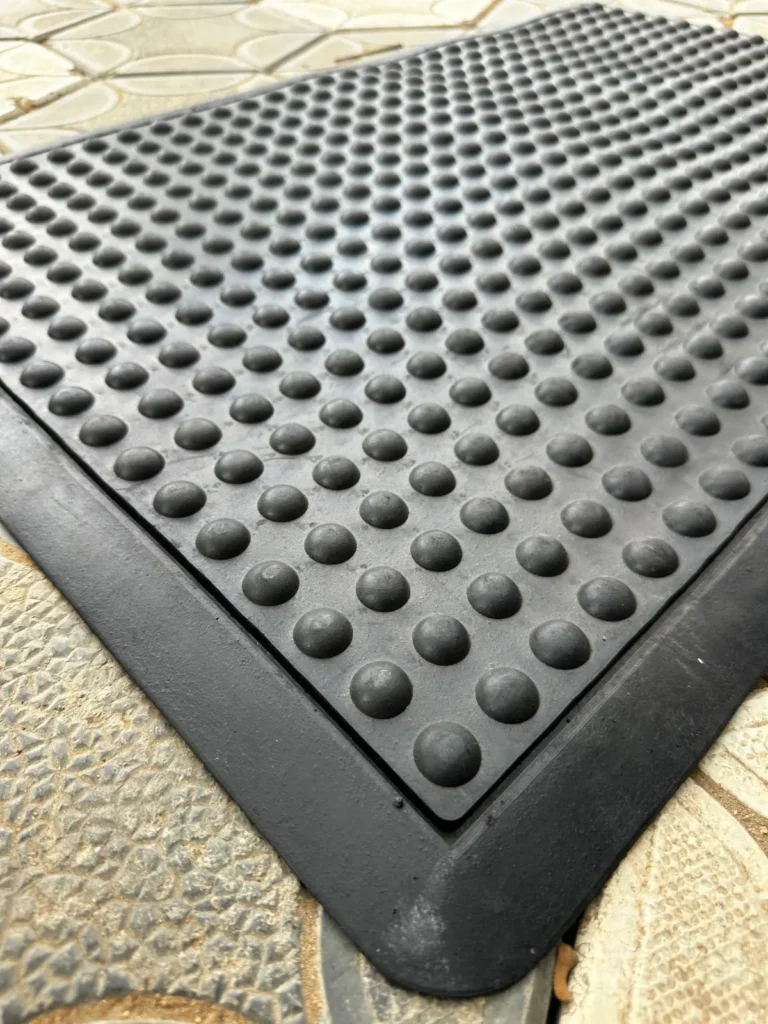 Close up of anti fatigue mat bubbles that cushion feet