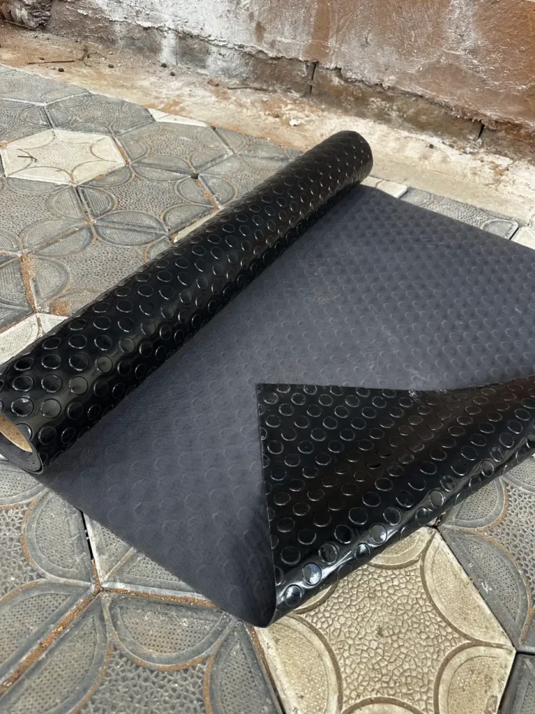 Coin mat 2mm being rolled out, anti slip rubber for vehicles and floors